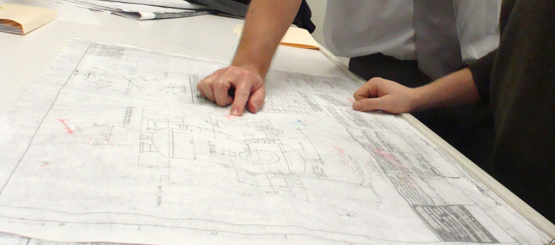 Project team reviewing drawings